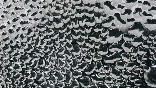 Water vapor condenses on metal surfaces