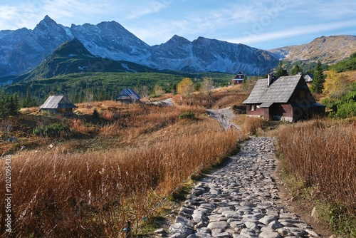 Beautiful autumn scenery of Hala Gasienicowa with wooden hut among Tatras Mountains. Poland