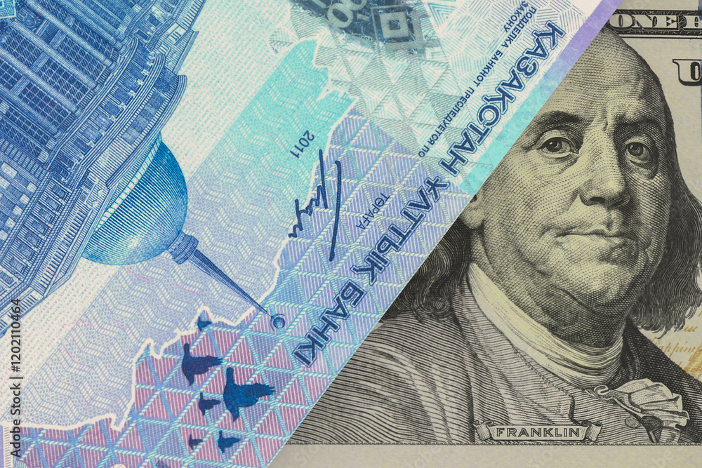 Portrait of the US President on the dollar bill peeks out from under the banknote of the Kazakhstani tenge. Foreign exchange market. Concept of finance Portrait of the US President on the dollar bill peeks out from under the banknote of the Kazakhstani tenge. Foreign exchange market. Concept of finance