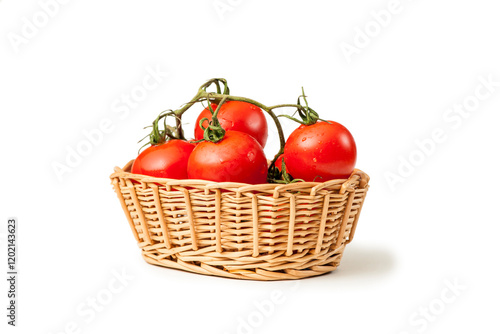 Basket with solanum lycopersicum tomatoes photo