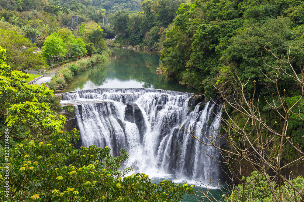 Shifen waterfall surrounded by tranquil nature in Taiwan Shifen waterfall surrounded by tranquil nature in Taiwan