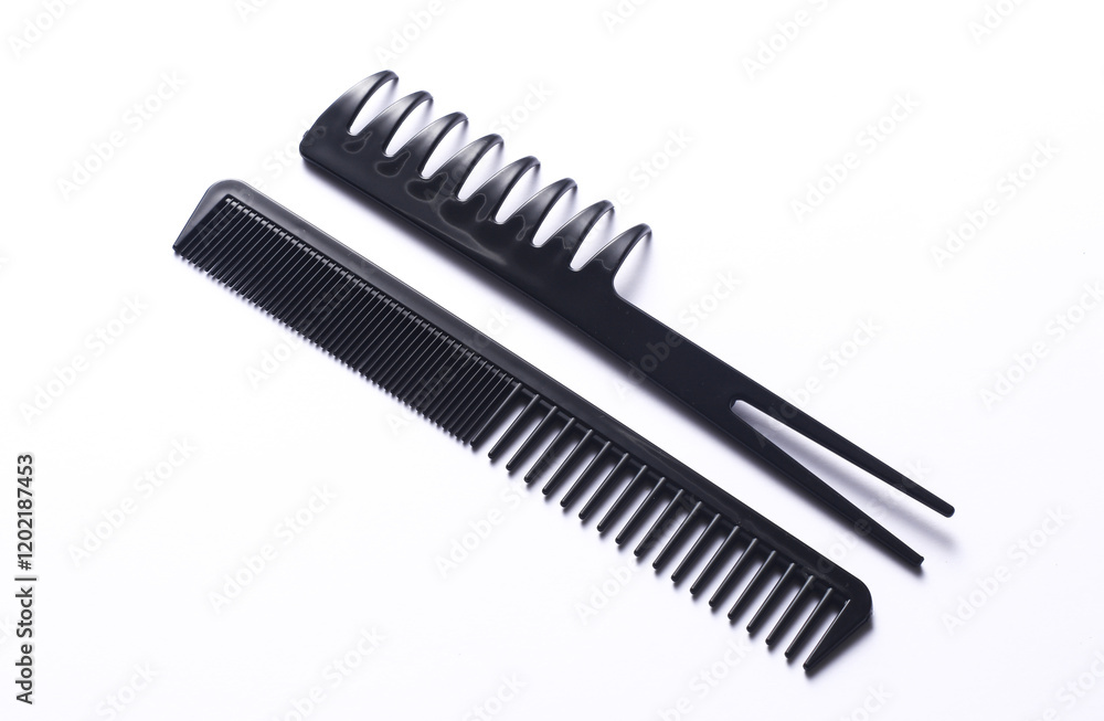 Set of black plastic combs on white background Set of black plastic combs on white background