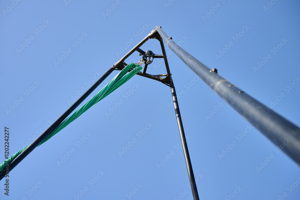 Metal structure that holds the fabrics and the rotating device to practice aerial silk dance outdoors. Metal structure that holds the fabrics and the rotating device to practice aerial silk dance outdoors.