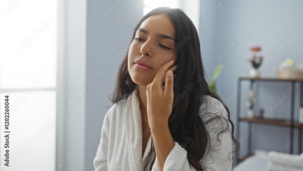 Woman enjoying a relaxing moment in a wellness center, bathed in natural light, showcasing her beauty and tranquility in a serene indoor spa environment. Woman enjoying a relaxing moment in a wellness center, bathed in natural light, showcasing her beauty and tranquility in a serene indoor spa environment.