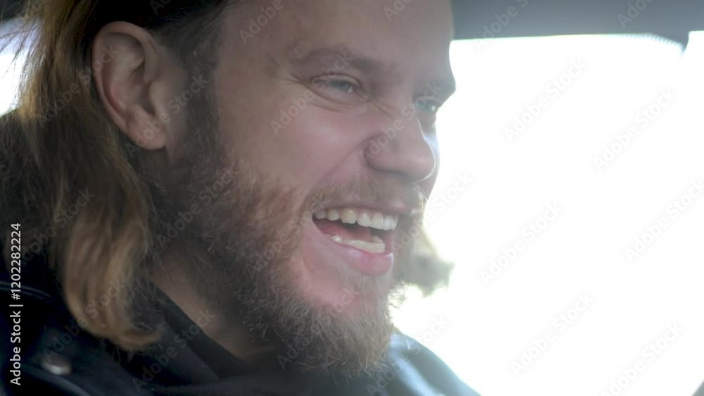 man in car reacts emotionally and psychopathically smiling man in car reacts emotionally and psychopathically smiling