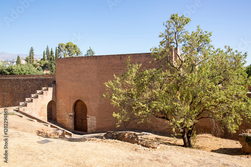 View of Gate of Seven Floors (Puerta de los Siete Suelos) located in the Alhambra, a palace and fortress complex located in Granada, Spain. photo