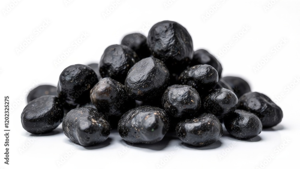 Black stones on a white background. Black stones on a white background.