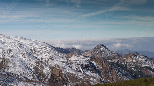 timelapse above theclouds of the sierra nevada mountains photo