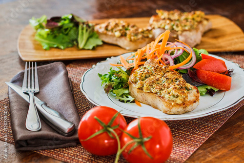 crusted broiled pork chops with a side salad