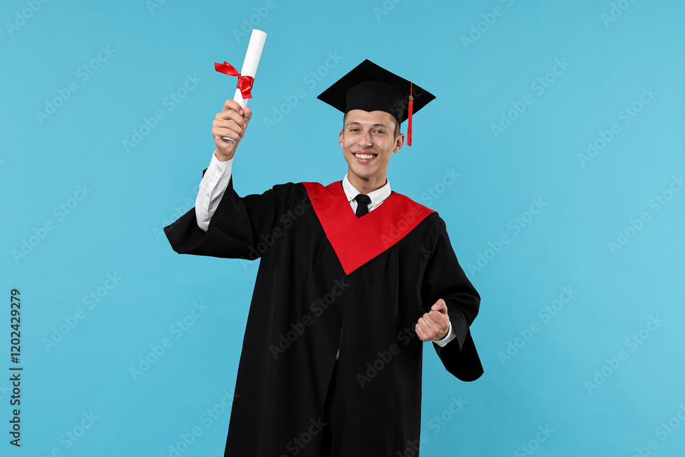 Happy student with diploma after graduation on light blue background Happy student with diploma after graduation on light blue background