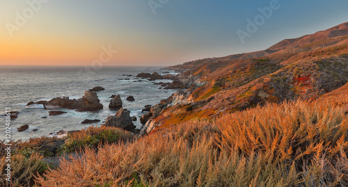 USA, California, Garrapata State Park. Sunset along the rugged coastline photo