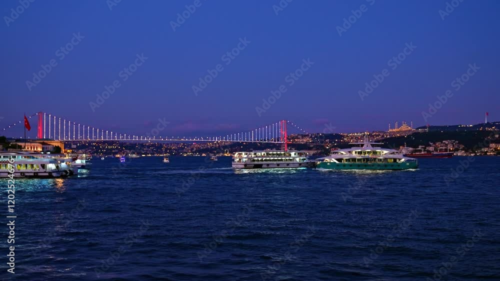 Istanbul Bosphorus Bridge: Evening lights illuminate the iconic bridge, reflecting on Bosphorus waters. This serene view highlights the city's charm and the bridge's captivating beauty.
Istanbul Bosphorus Bridge: Evening lights illuminate the iconic bridge, reflecting on Bosphorus waters. This serene view highlights the city's charm and the bridge's captivating beauty.
