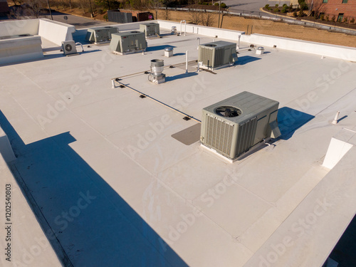 High Resolution Sunny Aerial Drone Image of a New TPO Roof on a Commercial Building With Visible HVAC Equipment: Roofing, HVAC, Architecture, Industry