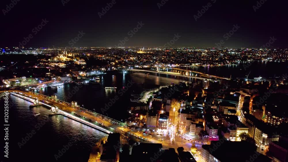 Galata Bridge and Golden Horn shine in Istanbul's night view, highlighting the historic peninsula, Eminönü, and Karaköy. The illuminated bridges over the Golden Horn stand as iconic city symbols. Galata Bridge and Golden Horn shine in Istanbul's night view, highlighting the historic peninsula, Eminönü, and Karaköy. The illuminated bridges over the Golden Horn stand as iconic city symbols.