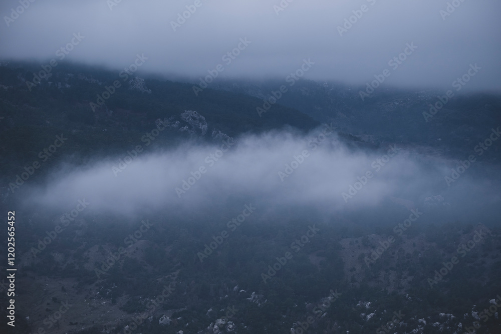 Fototapeta premium Clouds over the majestic mountain