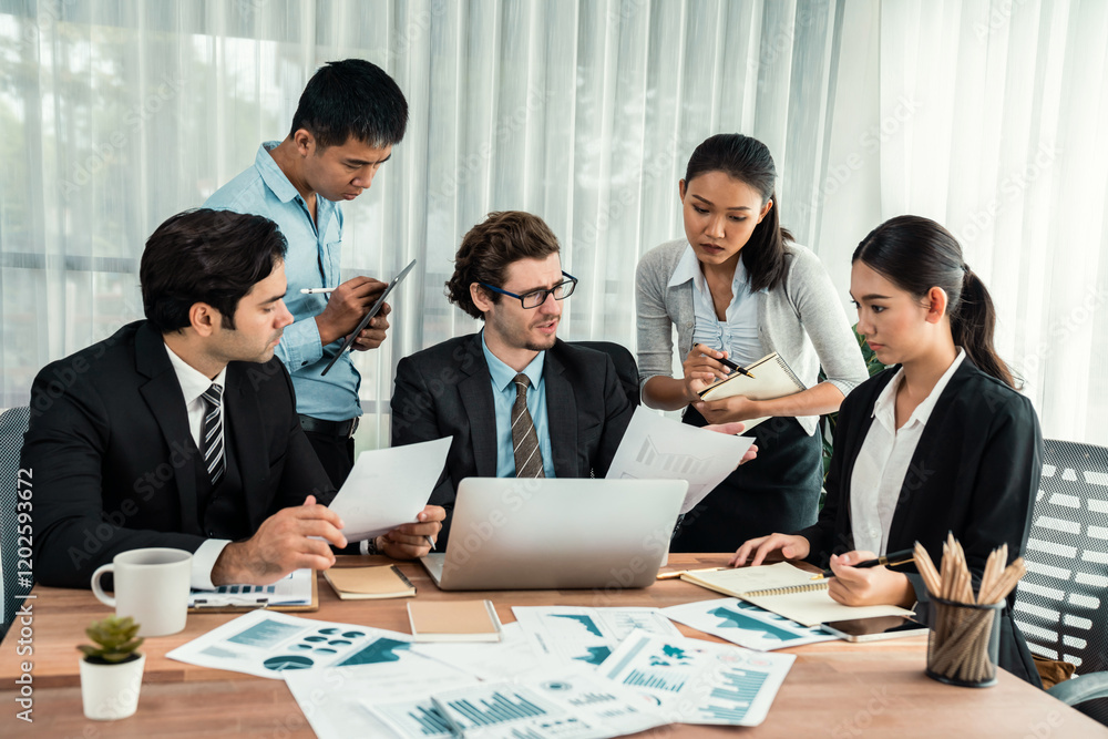 Diverse group of business analyst team analyzing financial data report paper on office table. Chart and graph dashboard by business intelligence analysis for strategic marketing planning Habiliment Diverse group of business analyst team analyzing financial data report paper on office table. Chart and graph dashboard by business intelligence analysis for strategic marketing planning Habiliment