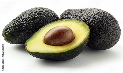 Fresh avocados, halved, on white background photo