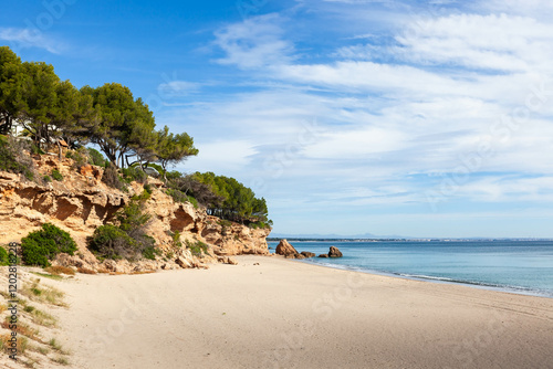 Fototapeta Naklejka Na Ścianę i Meble -  Mediterranean sea beach at Miami Platja coastal town in Southern Catalonia, Spain.
