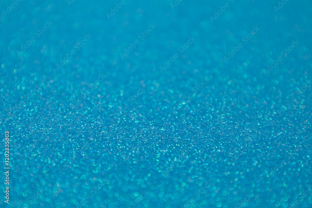 Full frame macro abstract texture background of a sparkling blue color glitter surface
Full frame macro abstract texture background of a sparkling blue color glitter surface