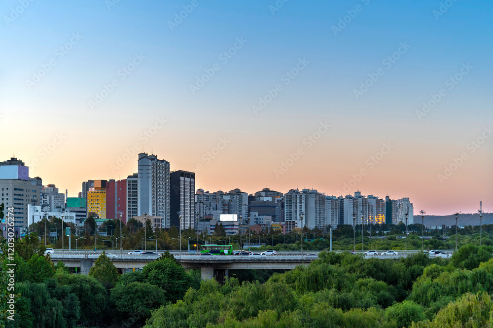 Aerial view of Yeouido Saetgang Ecological Park in autumn season with skyscrapers and modern buildings cityscape, Seoul city, Republic of Korea