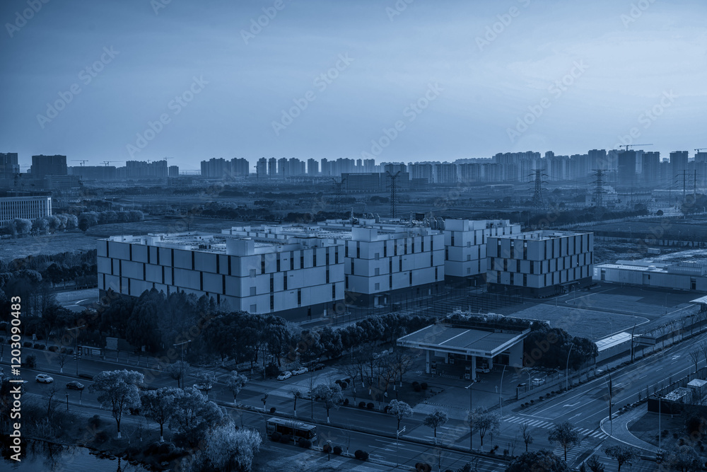 Fototapeta premium Modern Urban Architecture Under a Calm Blue Sky