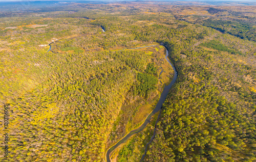 Bazhukovo, Russia. River Serga. Autumn landscape. Deer streams. Nature park in a wooded area, famous for its rich flora. Aerial view photo