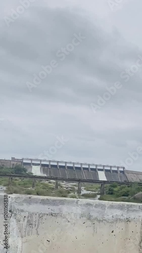 Pali, India - Jan 17, 2025: -  Wide angle view of water fall of Jawai bandh or dam located in sumerpur pali. photo