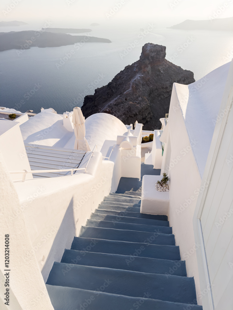 White architecture in Santorini island, Greece. Stairs to the sea.