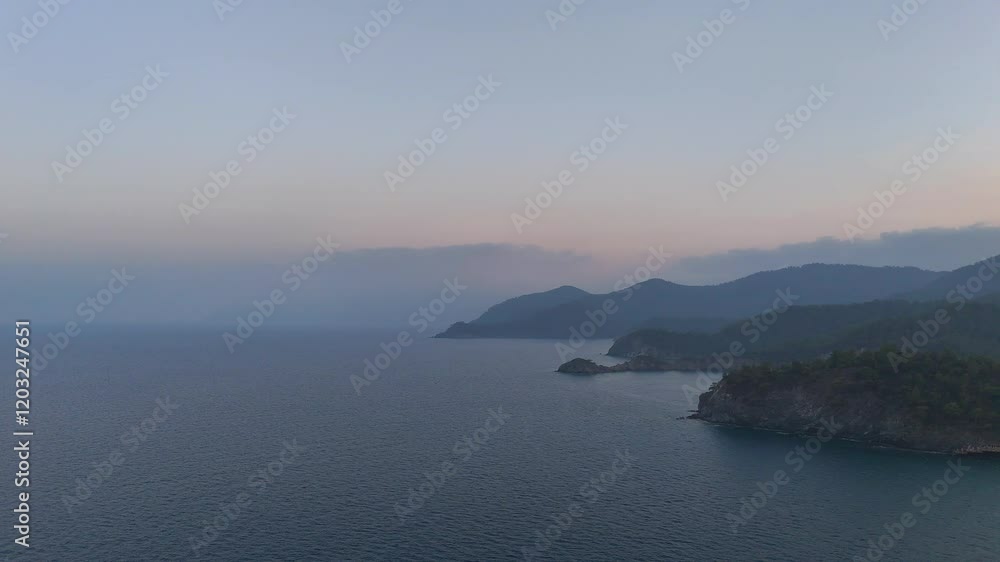 A mesmerizing drone view of a hotel set against a backdrop of majestic mountains, surrounded by pristine nature, offering peace and breathtaking vistas for travelers. A mesmerizing drone view of a hotel set against a backdrop of majestic mountains, surrounded by pristine nature, offering peace and breathtaking vistas for travelers.
