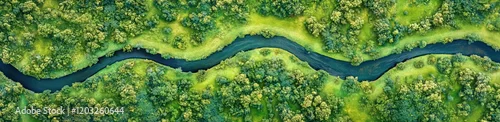 Panel kuchenny z motywem Aerial View of a River: A meandering river carves through a verdant forest, showcasing the breathtaking beauty and tranquility of nature's intricate design. Seen from a bird's eye perspective.
