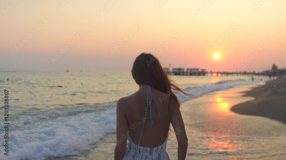 A joyful scene of a girl running along the beach during sunset, basking in the warm golden light and enjoying the serene coastal atmosphere. A joyful scene of a girl running along the beach during sunset, basking in the warm golden light and enjoying the serene coastal atmosphere.