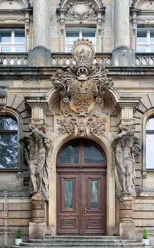 Old ornamental entrance door to a house in Wroclaw, Poland