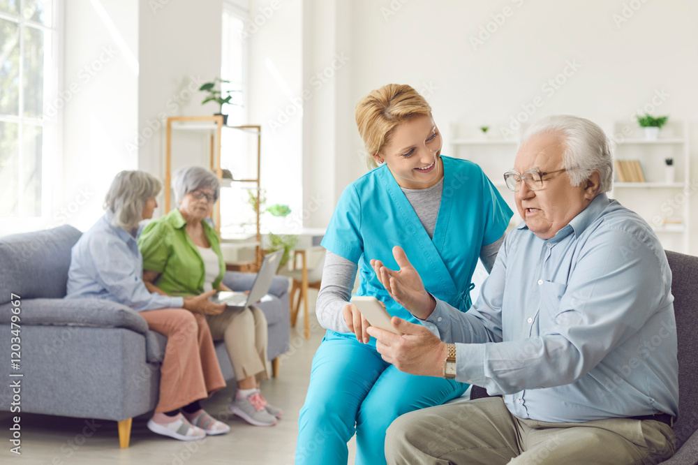 Obraz premium Senior old man and caring kind nurse, geriatric medicine caretaker helping with phone call for male nursing home resident, adult in assisted living, female doctor visiting patient, supporting