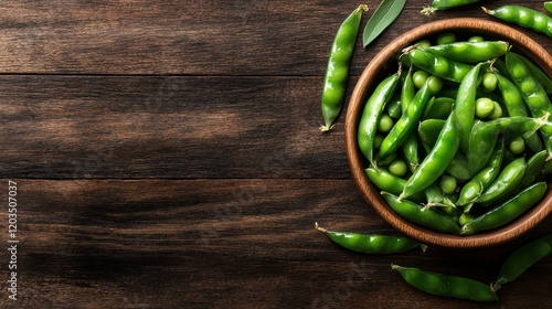 A stunning display of fresh snap peas in their pods, arranged in a rustic bowl, perfect for hinting at the freshness and crunchiness of seasonal produce. photo