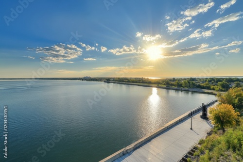 Wallpaper Mural Serene sunset over a calm river with a scenic shoreline and vibrant foliage Torontodigital.ca