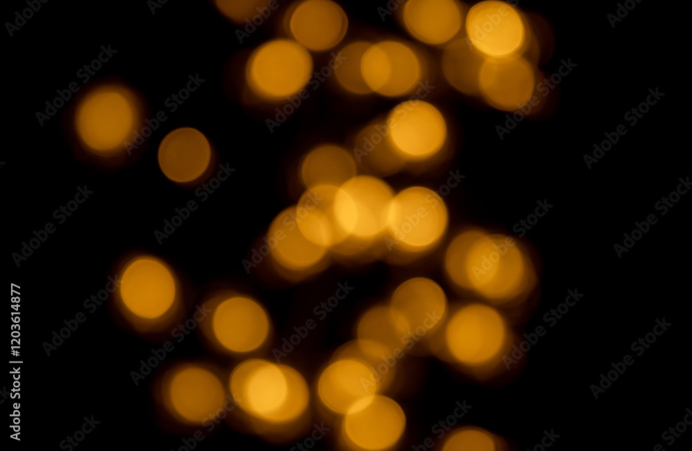 Fototapeta premium golden bokhe at night,Beautiful blurred light bokhe for background material.