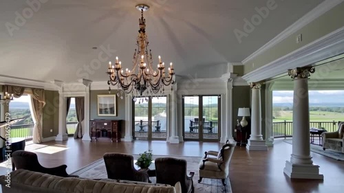 Sophisticated mansion interior featuring sleek furnishings and an abundance of natural light, creating an elegant atmosphere.