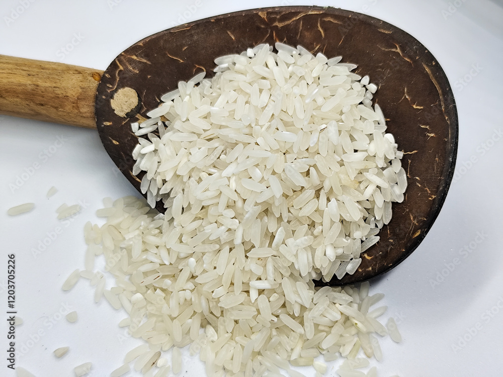 Unprocessed rice, on a natural blurred white background. Unprocessed rice, on a natural blurred white background.