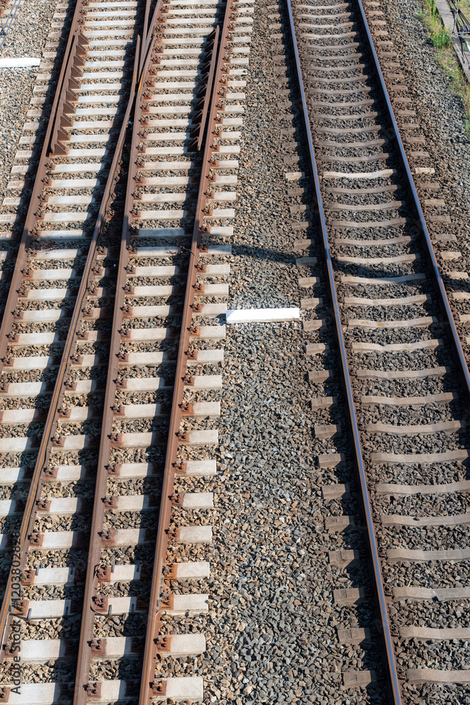 angle and image filling view of multiple railroad tracks with railroad switches angle and image filling view of multiple railroad tracks with railroad switches