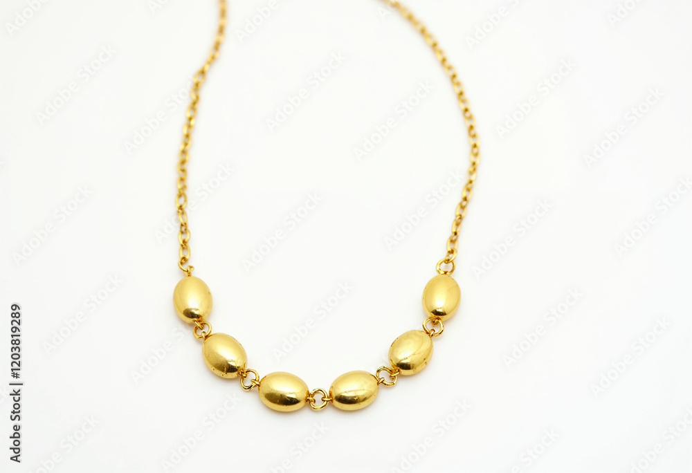 golden necklace isolated on white background golden necklace isolated on white background