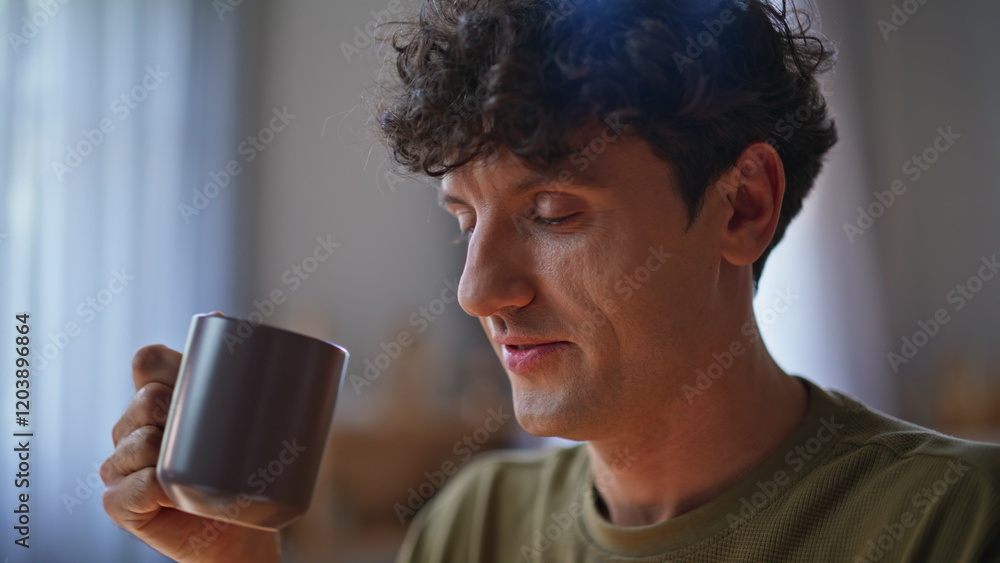 Happy worker sipping tea at home workplace closeup. Man hands typing keyboard Happy worker sipping tea at home workplace closeup. Man hands typing keyboard