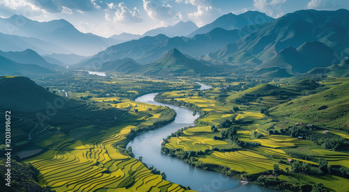 A stunning scenery with a semi overhead view, and a large river as the foreground, winding towards distant mountains. On both sides of the river are terraced fields and fields, planted with rice.