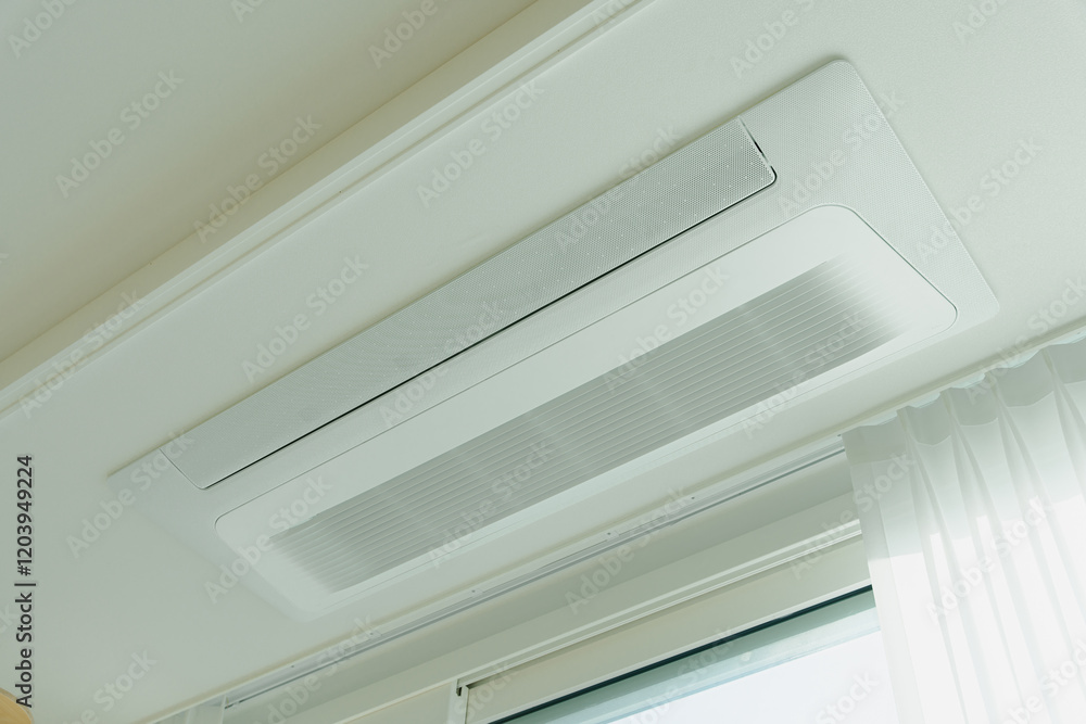 Obraz premium Ceiling-mounted air conditioning unit