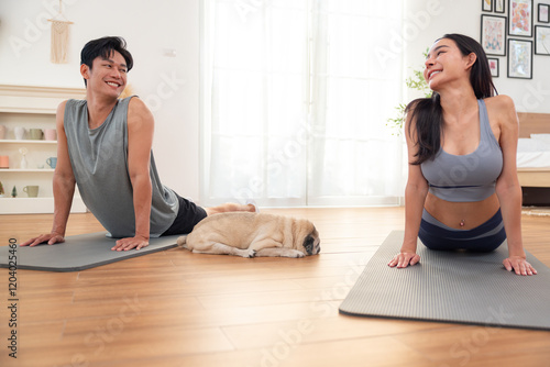 Wallpaper Mural Couple Practicing Yoga with Relaxed Pug Nearby Torontodigital.ca