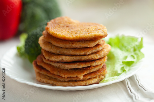 Wallpaper Mural A stack of golden-brown pancakes sits on a plate garnished with lettuce.  A healthy and delicious breakfast or snack. Torontodigital.ca