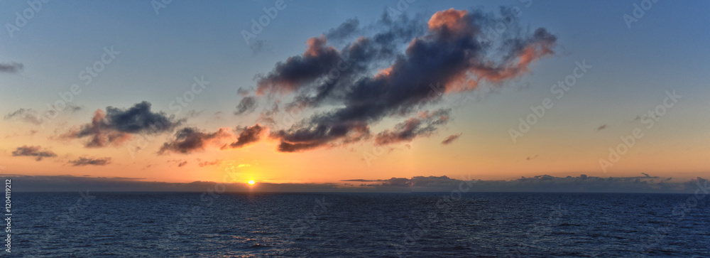 Naklejka premium Nordic Ocean Sunrise of the coast of Norway from boat, Summer 2024, Scandinavia, Europe. 