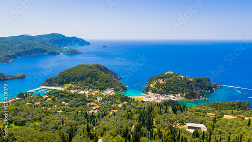 Panoramic view of Paleokastritsa village with azure bays and monastery on top of the hill, Corfu island, Greece