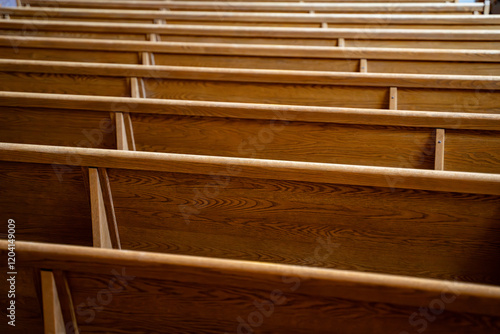 Wooden seating area inside a church photo