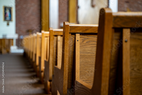 Wooden seating area inside a church photo