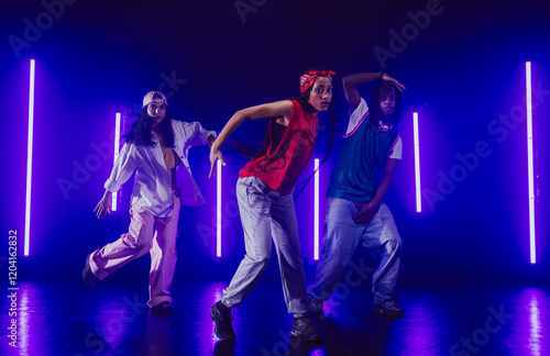 Group of hip hop dancer dancing together. photo